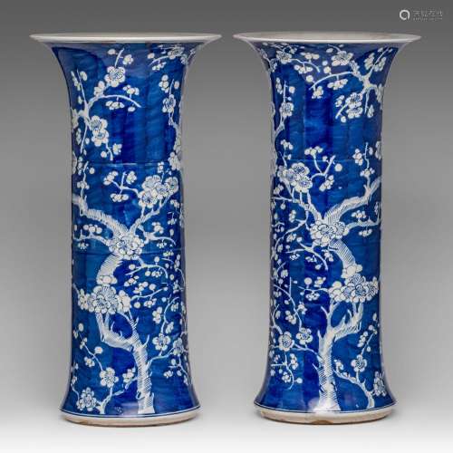A pair of Chinese blue and white 'Prunus' vases, of Gu form,...