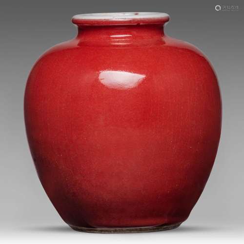 A Chinese monochrome red glazed pomegranate-shaped jar, H 18...