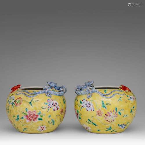 A pair of Chinese famille jaune jardinieres, with a Qianlong...