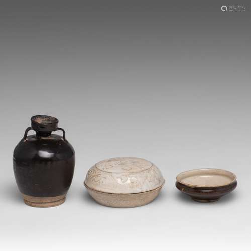 A Chinese black-glazed jar and a uniquely glazed tea bowl, p...