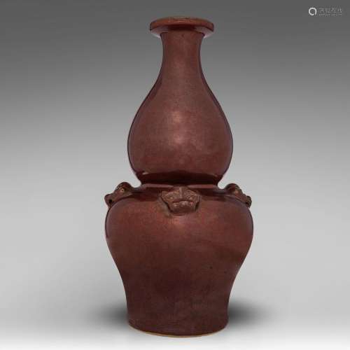 A Chinese iron-rust glazed double-gourd vase, 19thC, H 31 cm