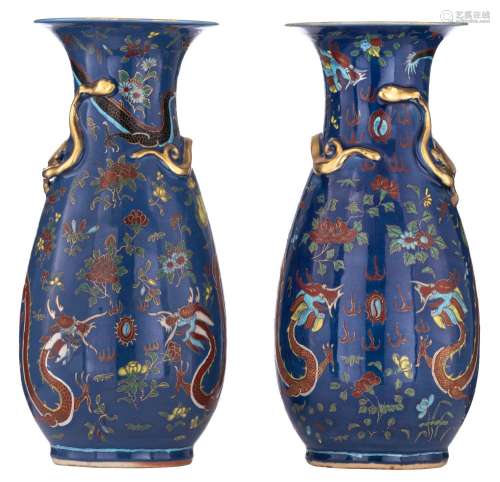 An exceptional pair of Chinese blue ground 'Dragon' vases, 1...