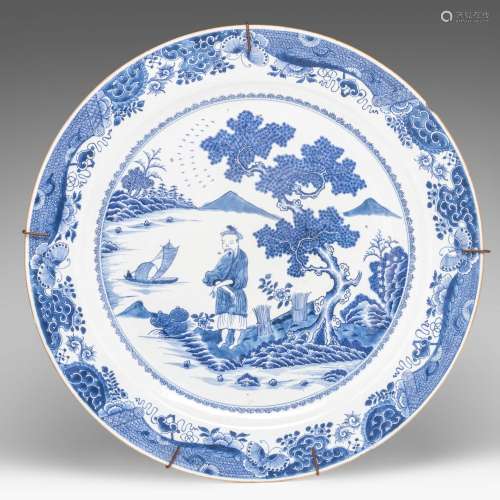 An impressive Chinese blue and white 'Wood cutter' charger, ...