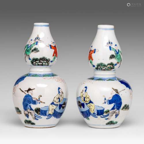 A pair of Chinese wucai 'Figures Playing Go' double gourd va...