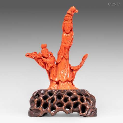 A Chinese coral group, depicting a female Immortal and a ser...