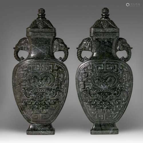 A pair of Chinese archaistic green jadeite vases and covers,...