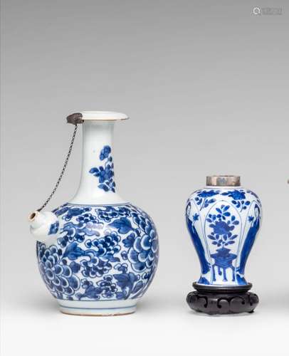 A Chinese blue and white floral decorated kendi and a blue a...