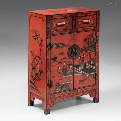 A Chinese coromandel-style red lacquer cabinet, jade belt-ho...