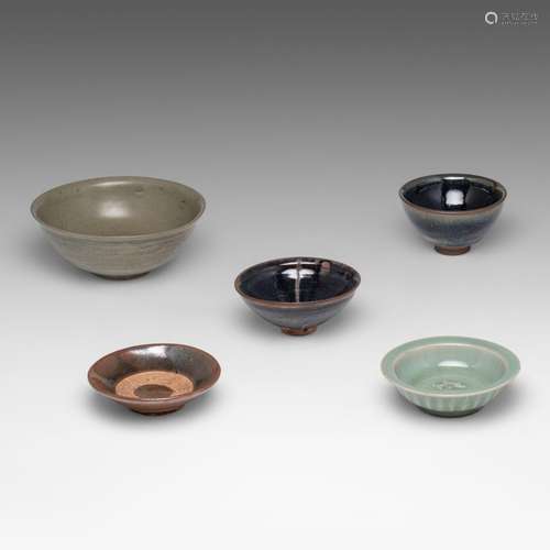 A collection of Chinese celadon and jian ware, largest, Song...