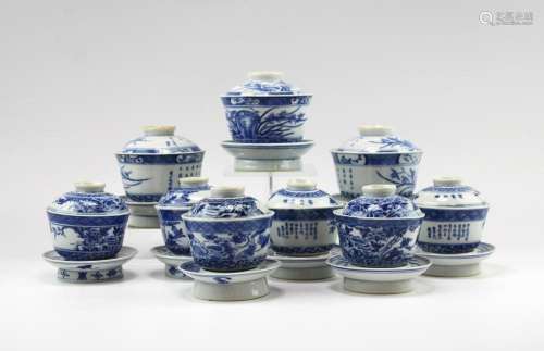 A group of blue and white Gaiwan cups and saucers