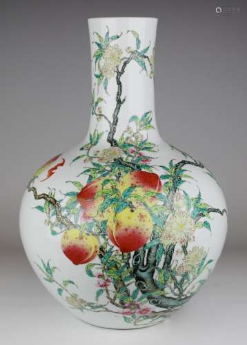 A large famille rose 'nine peach' bottle vase