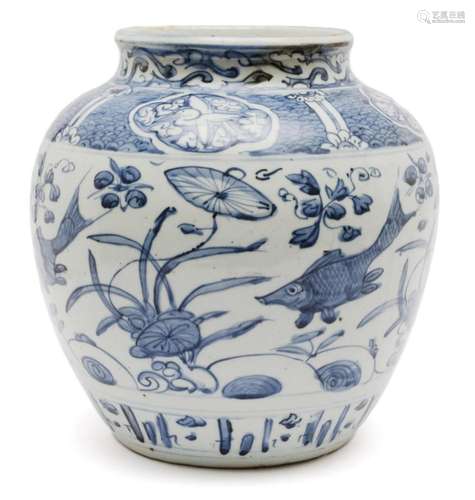 A large blue and white jar with fish pattern