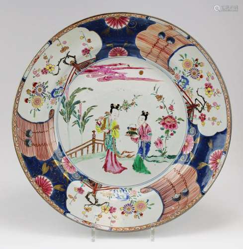 A large famille rose charger with figures