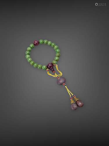 A jadeite and amethyst bead bangle, 20th century