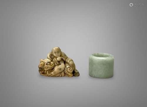 A Soapstone Lohan, and a Jadeite Archer's Ring, Qing dynasty