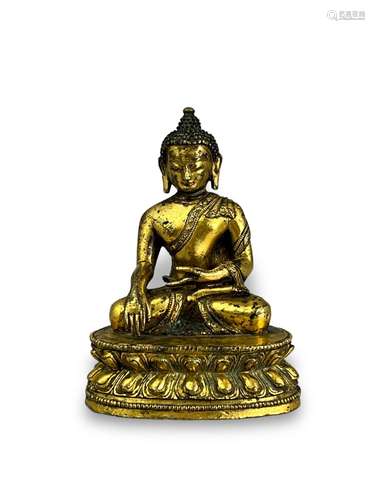 A Tibetan Gilt Bronze Figure of Sakyamuni, 16th century or e...