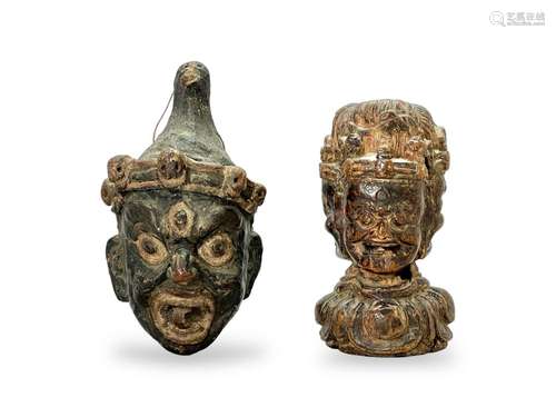 A Wood  Phurbu Handle, and a Demon Head, 18th century