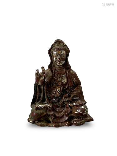 A small bronze seated Guanyin