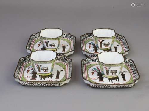 An attractive Set of Four Canton Enamel Cups and Saucers, Qi...