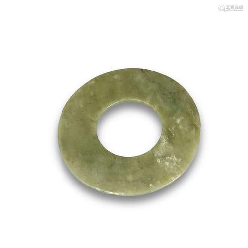 A celadon jade disc, huan, Neolithic period