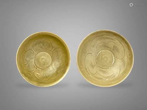 Two yellowish celadon glazed carved bowls, Song dynasty