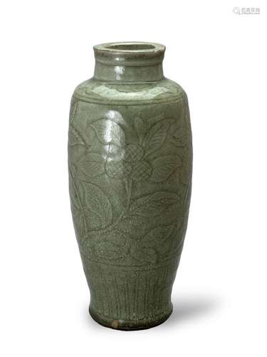 A celadon-glaze carved Vase with lychee and leaves on the ex...