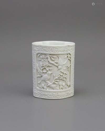 A Carved Whiteware Brushpot,  Qing dynasty