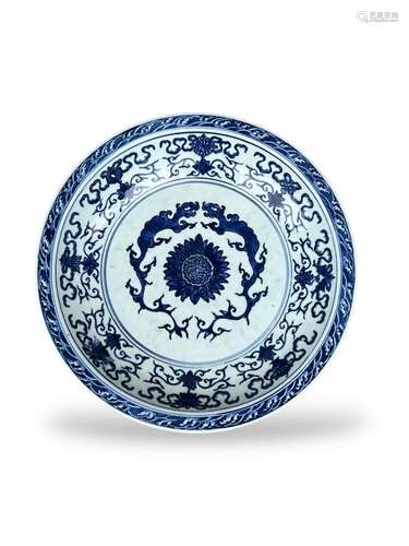 A fine Ming style blue and white large Dish, early 18th cent...