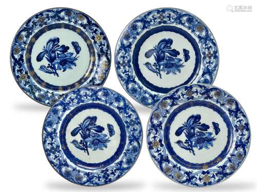 A Set of Four 'Botanical' Plates, early Qianlong