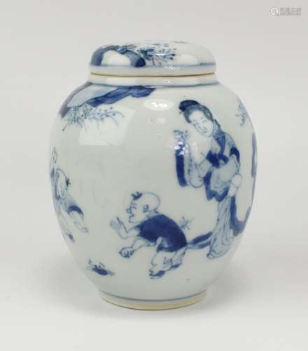 A small blue and white ovoid tea canister with cover