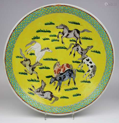 A yelow ground charger with the eight horses of Wang Mu