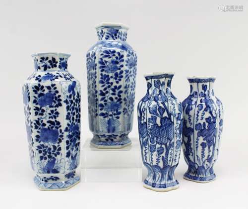 Four blue and white vases