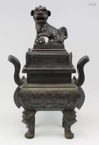 A rectangular bronze censer with foo dog finial