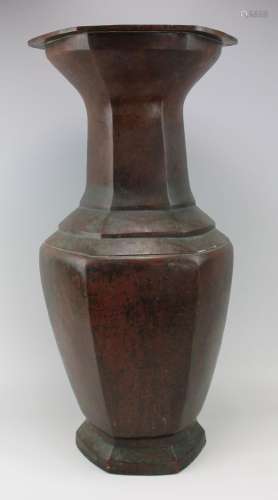 A large copper/bronze vase
