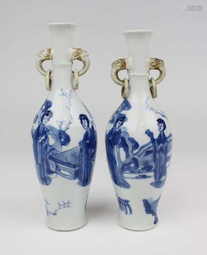 A pair of blue and white vases