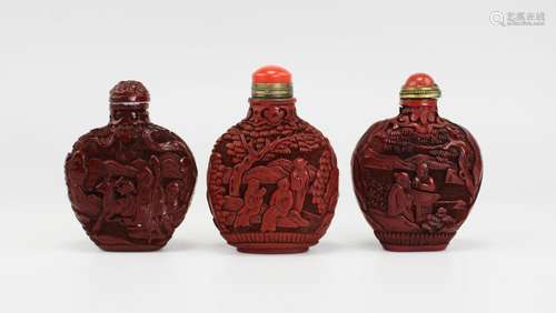 Three cinnabar snuff bottles