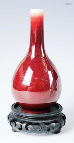A small sang-de-boeuf pear-shaped vase