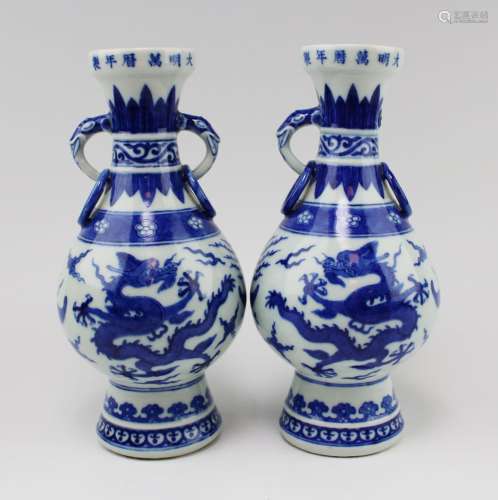 A pair of blue and white dragon vases