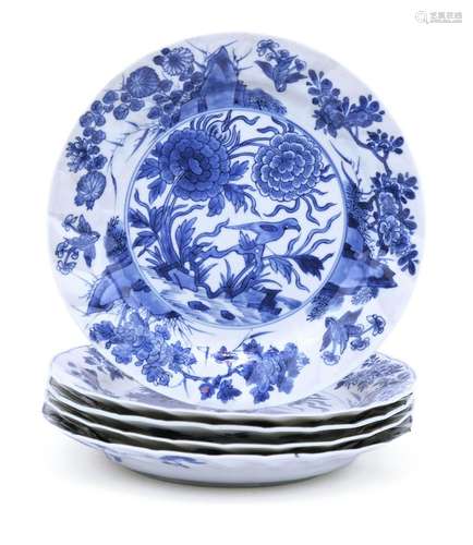 Five blue and white plates