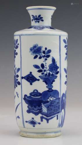 A cylindrical blue and white vase