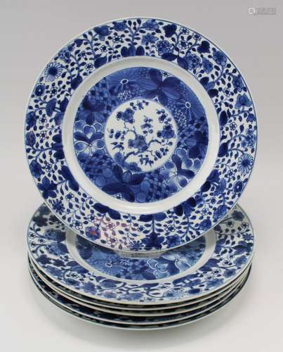 Six blue and white floral plates