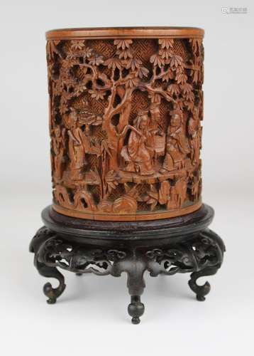 A Chinese bamboo wooden brush pot on stand