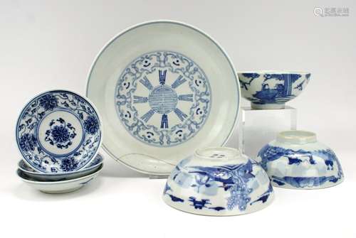 Three blue and white bowls, a plate and three saucers