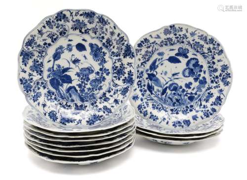 A set of twelve blue and white plates