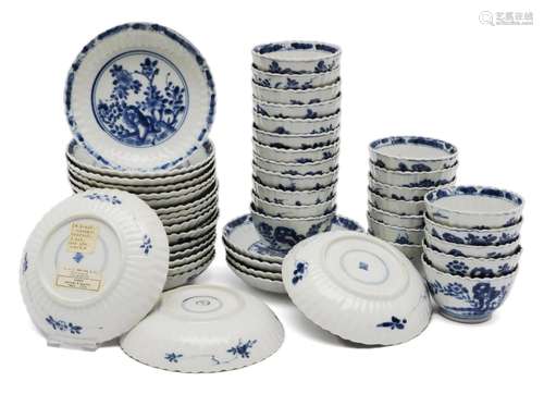 A set of twenty-four blue and white cups and saucers