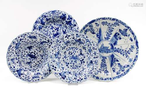 Three 'crab & fish' dishes and a large blue and white pl...