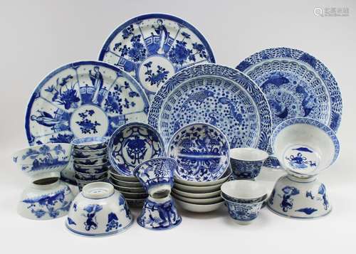 A large group of blue and white plates, bowls and cups &...