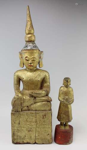 A gilt wood Maravijaya Buddha with inscription and a small w...