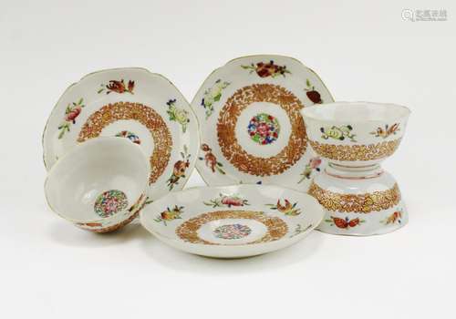 Three famille rose cups and saucers