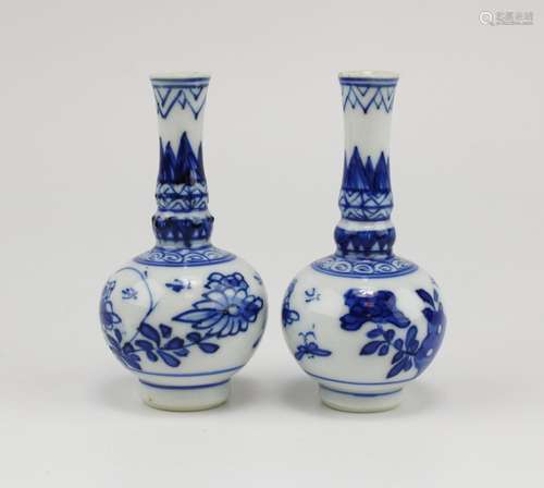 Two blue and white miniature vases